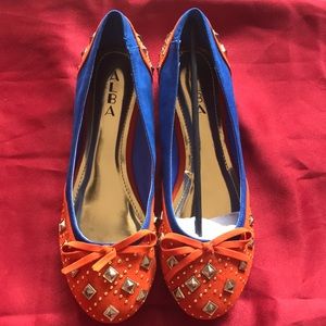 Orange and blue studded flats